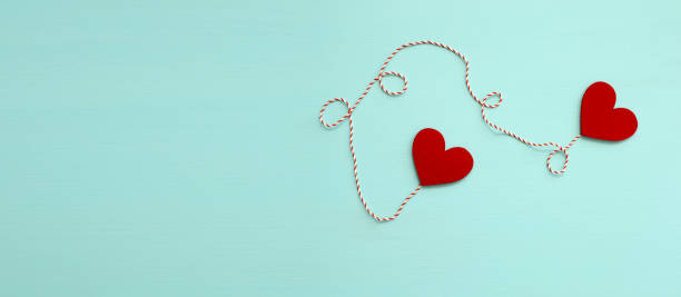 istock Heart Shapes On Blue Background 1281073653