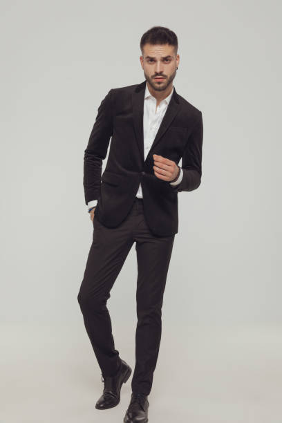istock Charming fashion model explain with hand in pocket while walking 1281075388