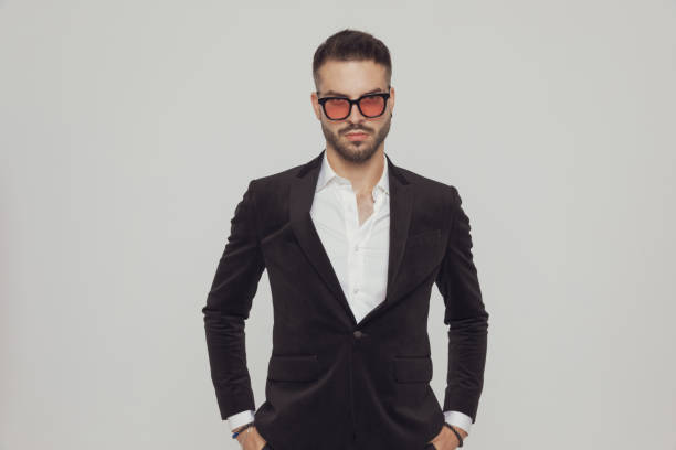 istock Confident fashion model holding both hands in pockets 1281075478