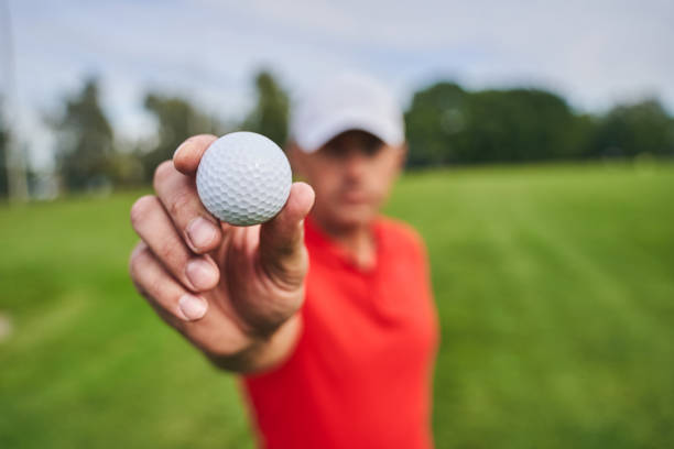 istock Caucasian golfer in a cap standing outside 1281079414