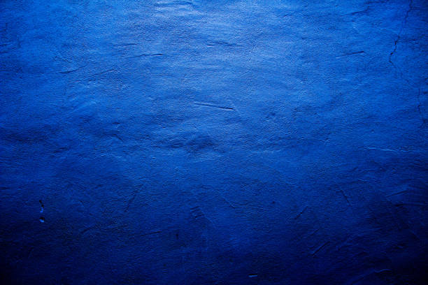 istock Blue colored abstract wall background with textures of different shades of blue 1281080144
