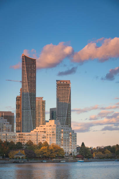 istock Residential towers along a lake. 1281082447