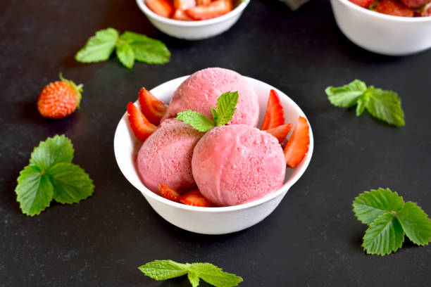 istock Strawberry ice cream in bowl 1281083917