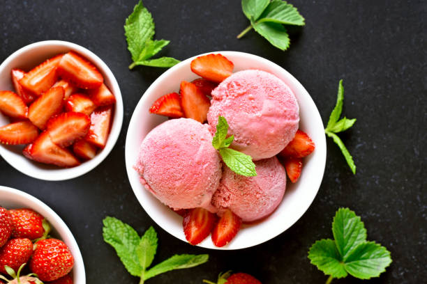 istock Strawberry ice cream in bowl 1281083922