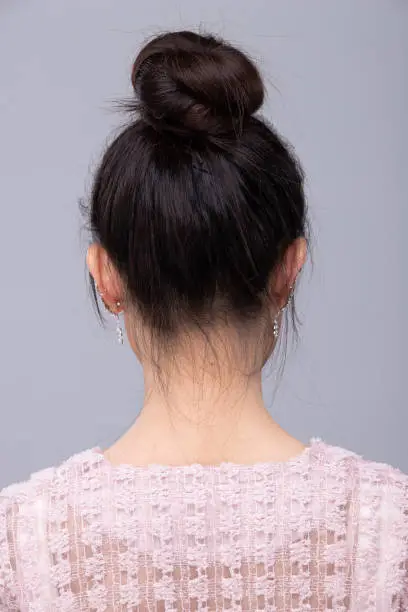 Photo of Back rear view of Asian people present Hair style of black short