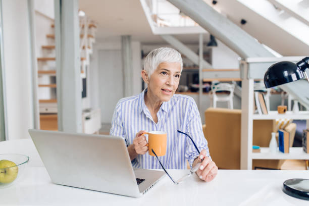 istock Mature entrepreneur working at home 1281084062