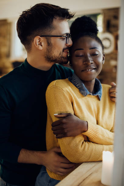 istock Young affectionate couple enjoying in their love at home. 1281085489