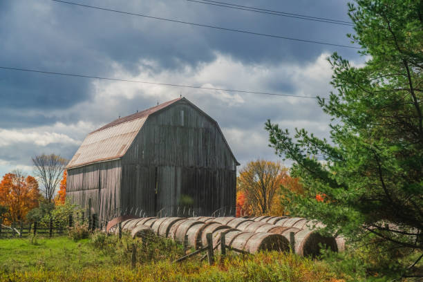 Autumn Landscape - Large Barn with Hay Bales in Front