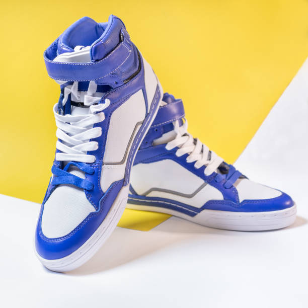 Blue white high tops shoes Blue white high tops shoes isolated high tops stock pictures, royalty-free photos & images