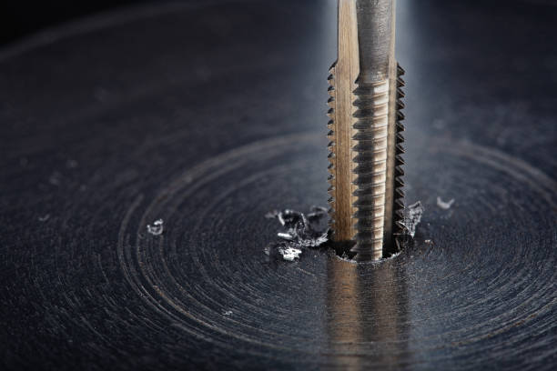 istock Thread tap. Tap drill steel billet. Working cutter. 1281093552