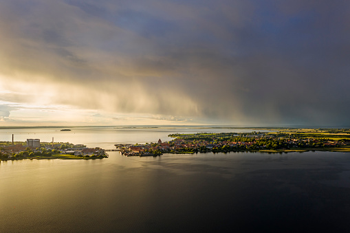 Drone view of Stege Nor on the Island of Mon in Denmark taken during an epic storm and sunset. Colour horizontal with some copy space.