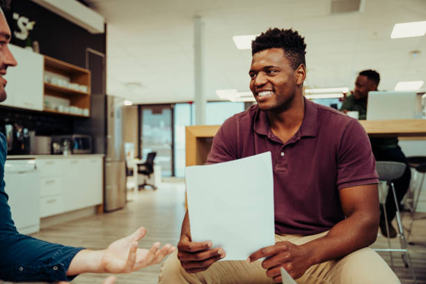 istock mixed race male business man discussing work with manager holding paper work preparing for interview with new business 1281096667