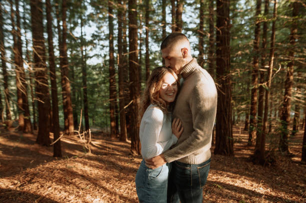 istock Young couple in a forest 1281098101