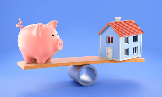 3d model house and piggy bank balancing on a seesaw