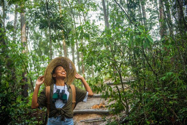 Portrait of young brazilian woman explorer in wilderness
