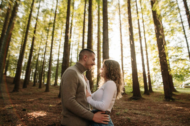 istock Young couple in a forest 1281098572