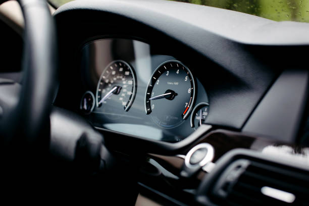 Modern mileage car dashboard instrument panel interior. Miles Speedometer. stock photo