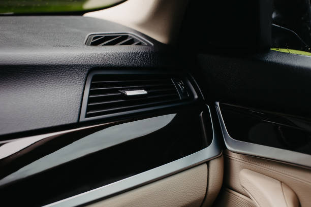istock Air conditioner vent grill in a modern car. 1281098911