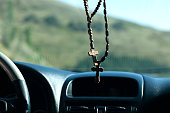 wooden cross in car