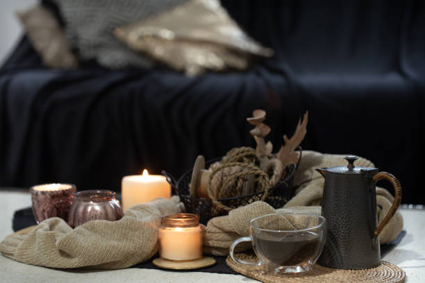 istock Still life with home decor details in the foreground on dark background 1281100263