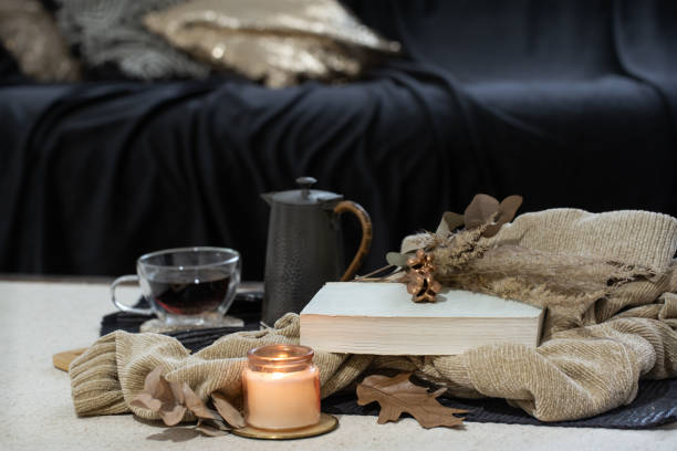 istock Still life with home decor details in the foreground on dark background 1281100270
