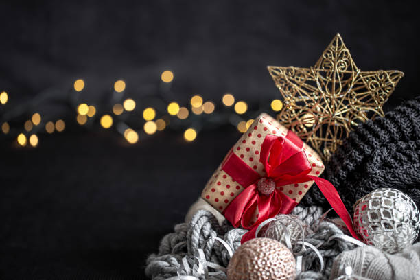 Christmas composition with a blurred dark background. Place for an inscription.