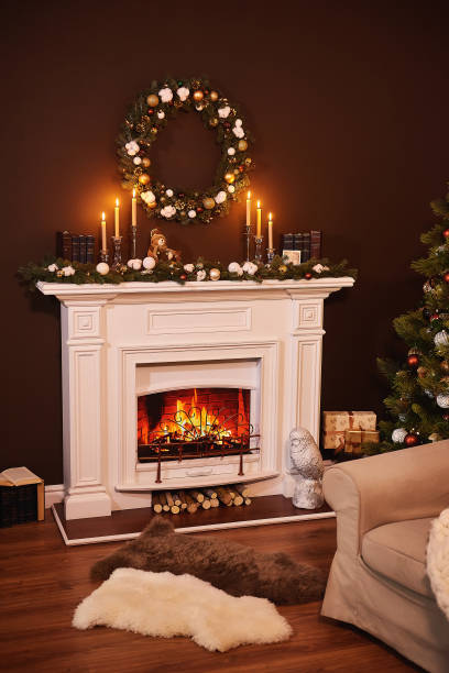 istock Christmas fireplace interior. Modern style interior of fireplace 1281104706