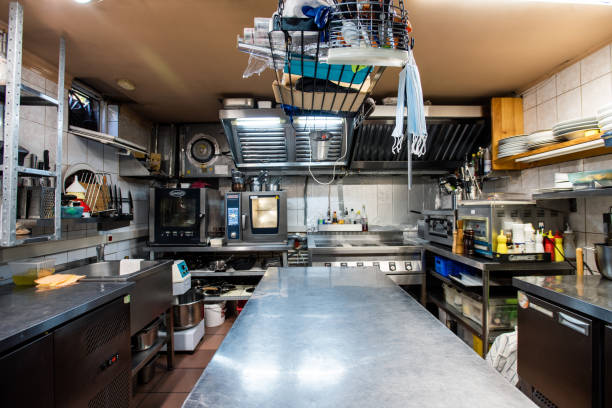 istock Interior of large kitchen of modern luxurious restaurant including kitchenware 1281105027