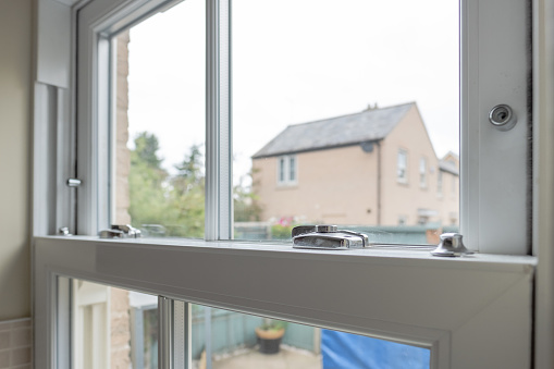 Detailed view of a newly installed, energy saving double glazed sash window .