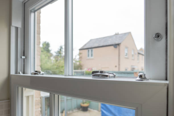 Detailed view of a newly installed, energy saving double glazed sash window . stock photo