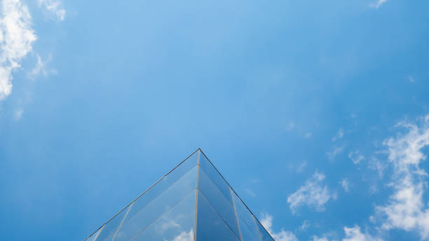 istock glass structure with blue sky and clouds on the background 1281110942