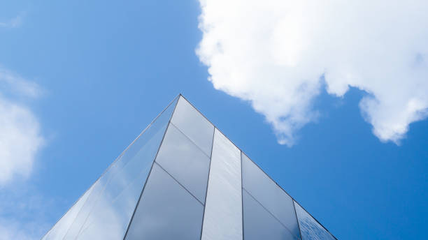 istock glass structure with blue sky and clouds on the background 1281111152
