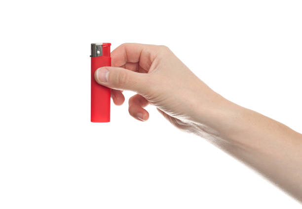 istock red lighter in male hand isolated on white background 1281111329