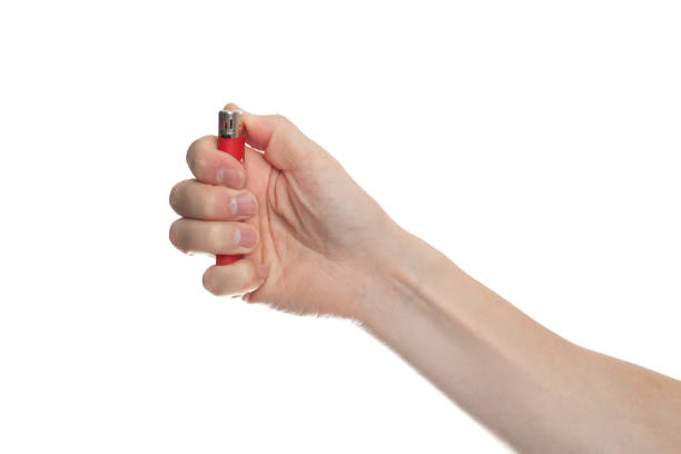istock red lighter in male hand isolated on white background 1281111336