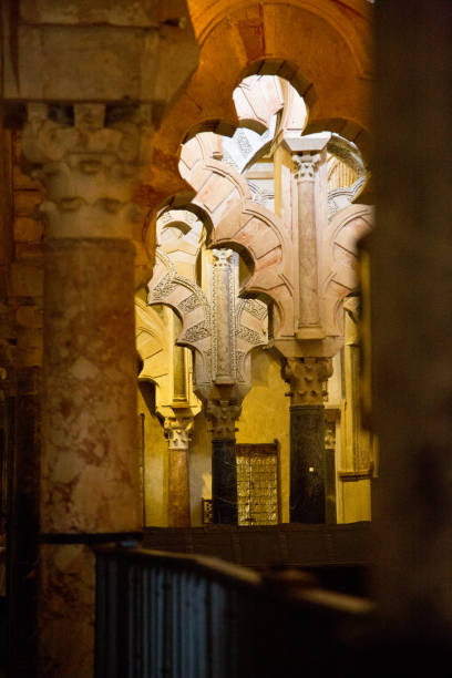 Mozarabic arches with ornate capitals Mozarabic arches with ornate capitals in Córdoba, AL, Spain mozarabic stock pictures, royalty-free photos & images