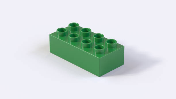 istock Green Plastic Toy Brick on a White Background 1281115988