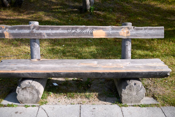 Saint Moritz, Switzerland - July 22, 2020: Wood bench in Saint Moritz