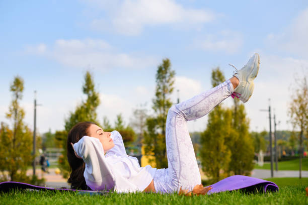 istock Beautiful girl work out at green park 1281121521