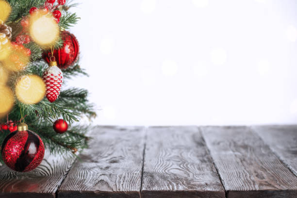 istock Christmas background with Christmas tree decorated red balls with defocused lights in foreground. 1281121884