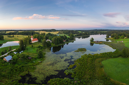 Panoramic view of Araisi lake and Lutheran church near Cesis, photographed with a drone