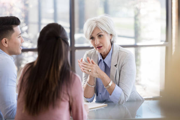 istock Marriage counselor talks with couple 1281125950