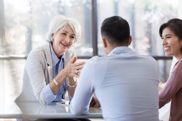 istock Confident doctor talks with patient 1281125959