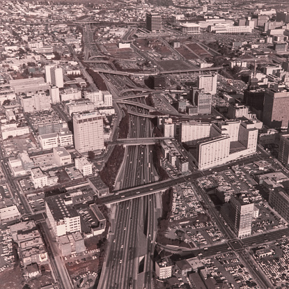 Downtown Los Angeles Skyline during the 1940's. Downtown, comprising diverse smaller areas such as Chinatown, Little Tokyo and the Arts District, offers renowned art museums, cutting-edge restaurants & hip bars. Modern high-rises mix with architectural landmarks, such as El Pueblo de Los Angeles, the city’s 1781 birthplace. Anchoring the Music Center performing arts complex is Walt Disney Concert Hall, with striking steel architecture designed by Frank Gehry. Copyright has expired on this artwork. Digitally restored historic photos.