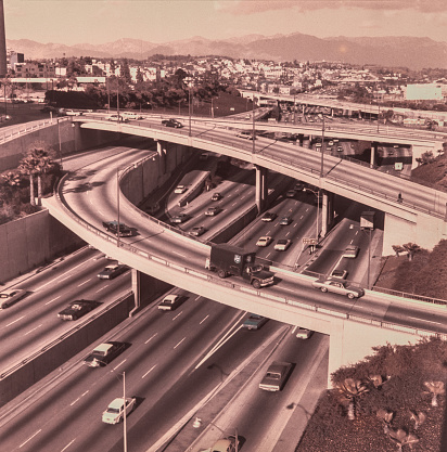 Downtown Los Angeles Skyline during the 1940's. Downtown, comprising diverse smaller areas such as Chinatown, Little Tokyo and the Arts District, offers renowned art museums, cutting-edge restaurants & hip bars. Modern high-rises mix with architectural landmarks, such as El Pueblo de Los Angeles, the city’s 1781 birthplace. Anchoring the Music Center performing arts complex is Walt Disney Concert Hall, with striking steel architecture designed by Frank Gehry. Copyright has expired on this artwork. Digitally restored historic photos.