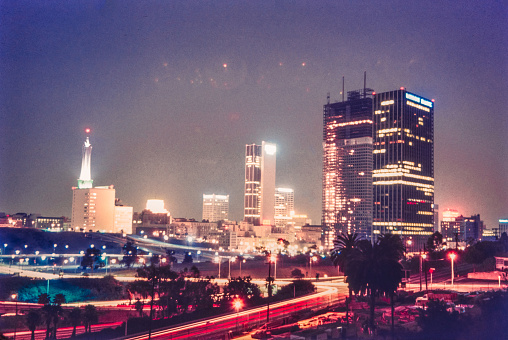 Downtown Los Angeles Skyline during the 1950's. Downtown, comprising diverse smaller areas such as Chinatown, Little Tokyo and the Arts District, offers, cutting-edge restaurants & hip bars. Modern high-rises mix with architectural landmarks, such as El Pueblo de Los Angeles, the city’s 1781 birthplace. Anchoring the Music Center performing arts complex Concert Hall, with striking steel architecture. Digitally restored historic photos.