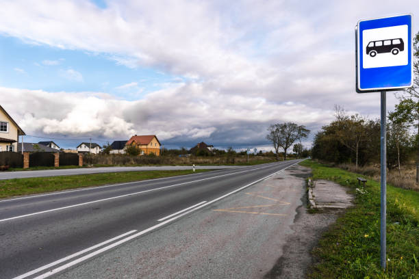istock Country road view with a bus stop at daytime 1281129056