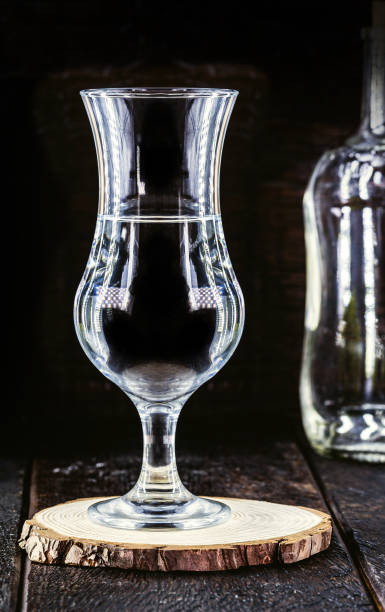 szklanka brandy na bazie winogron, zwana bagaceira w portugalii i we włoszech grappa lub graspa - grappa photography food and drink vertical zdjęcia i obrazy z banku zdjęć