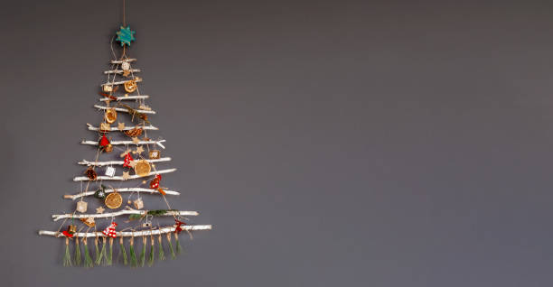 istock Alternative Christmas tree made with branches, decorated with ecological toys, zero waste holidays 1281133127