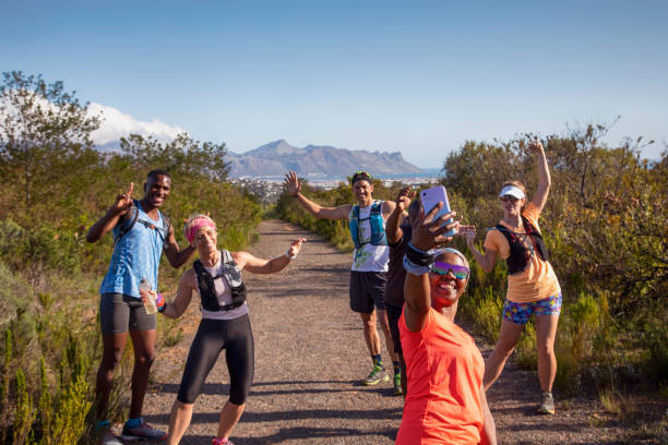 istock A multi-ethnic group of hikers taking a group selfie. 1281134335