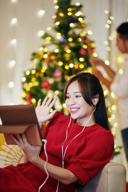 istock Woman video calling her friends 1281134789